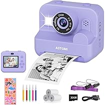 CHAKEYAKE Macchina Fotografica Bambini Istantanea,2,4 Pollici Digitale Fotocamera Bambini con 32GB TF Scheda e Carta Fotografica per Stampa, Regalo per Bambini dai 3-12 Anni (Pianeta Viola