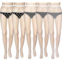 Le Gambe Della Donna In Calze A Rete Nere Su Hanno Attraversato Il Bianco Nero 47748518