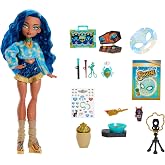 &Ccedil;&ouml;mlek&ccedil;ilik seti ve makyaj malzemeleri dahil 13 ger&ccedil;ek&ccedil;i s&uuml;rpriz i&ccedil;eren Monster High G&uuml;zellik Sırları Cleo De Nile bebek ve a
