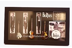 ROCK GUITAR MINIATURES RGM8868 Beatles Miniature Guitar Collection includes three mounted replica Beatles miniature guitars bass drum in a shadowbox frame. A delightful gift for any Beatles fan