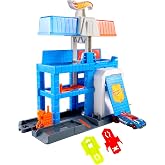 Hot Wheels Oyuncak Araba Par&ccedil;a Seti, Şehir Şehir Merkezi Polis Kulesi Playset ve 1:64 &Ouml;l&ccedil;ekli D&ouml;k&uuml;m Polis Aracı, 3 Seviyeye G