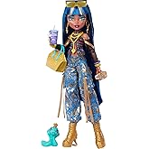 Monster High Kısa bluz ve altın rengi detaylı kot kargo pantolon giyen Monster High Cleo De Nile bebek, evcil yılanı Hissette