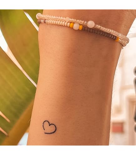 Inkster Tattoo - Stechpalme und Fink vegane & wasserfeste Temporre Tattoos  fr Erwachsene - EU-Kosmetikzertifizierte Farbe - revolutionres 2 Wochen  Tattoo | Premium Klebetattoos : Amazon.de: Fashion