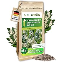 Purgrn Portugiesischer-Kirschlorbeer-Dnger 1 kg  Extra Magnesium fr  sattgrne Bltter  Frdert schnelles Wachstum fr eine dichte Hecke   Feines Krmelgranulat fr ca. 30 Heckenpflanzen : Amazon.de: Garten
