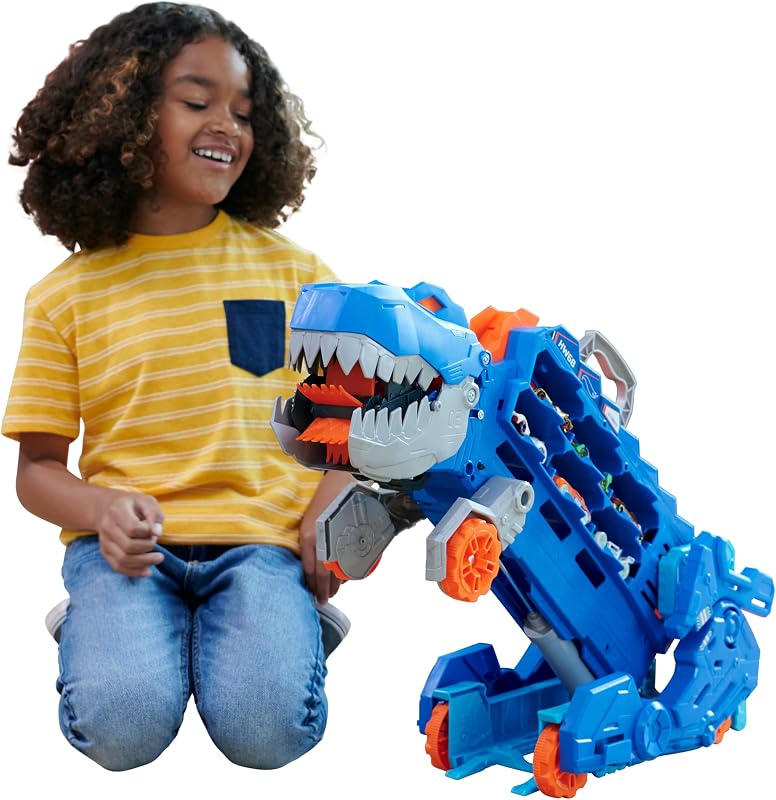 HOT WHEELS City - Ultimativer Transporter, T-Rex und Rennstrecke in Einem, abwechslungsreiche Sensorik-Elemente, Beleuchtungen und Geräusche, umfasst 20 Autos, für Kinder ab 4 Jahre, HNG50
