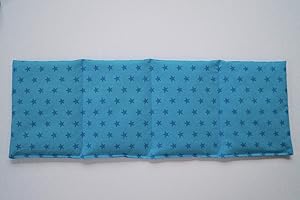 TITSCH Körnerkissen Weizen 4-Kammern 50cmx17cm Feincord helltürkis/dunkeltürkis Sterne