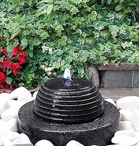 Brunnen Mühlstein mit Kugel, Erdeinbaubrunnen, Naturstein