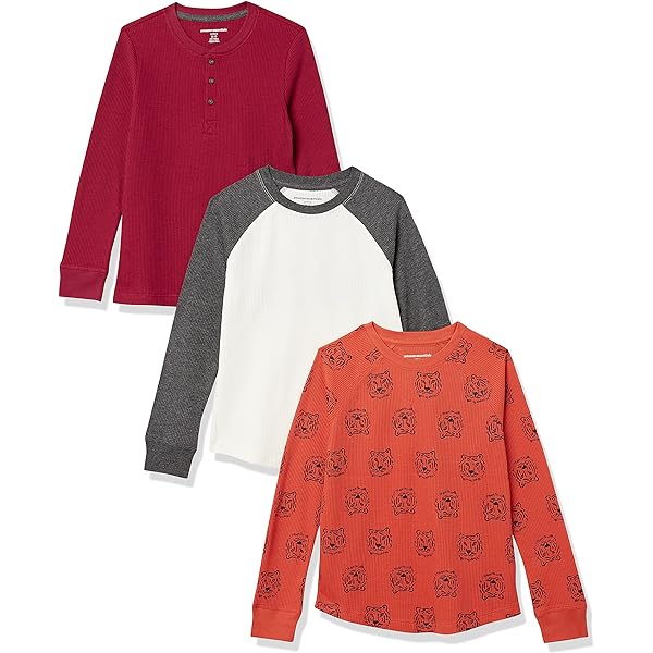 Garçon En T-shirt Orange Avec Grimace | Photo Gratuite