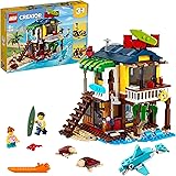 LEGO Creator Surfer Beach House, Kit di Costruzione in Mattoncini 3 in 1, Faro e Casetta con Piscina e Animali Giocattolo, Gi